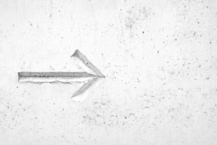 Direction arrow representing growth and forward progress at Satya Setu Club